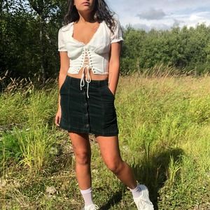 Green corduroy mini skirt